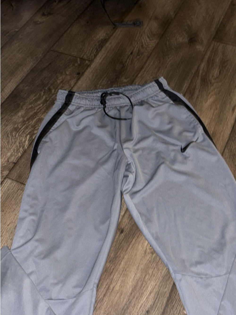 Nike Gray Athletic Shorts with Black Logo
